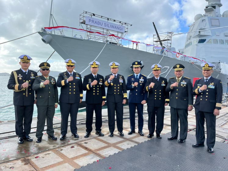 Navy chief of staff Adm. Muhammad Ali (center) and other officers pose in front of the KRI Prabu Siliwangi during a naming ceremony at the Italian shipbuilder Fincantieri's facility in Muggiano, Italy, on Jan. 29, 2025. The Prabu Siliwangi is one of the two latest warships being named, the other being the KRI Brawijaya.