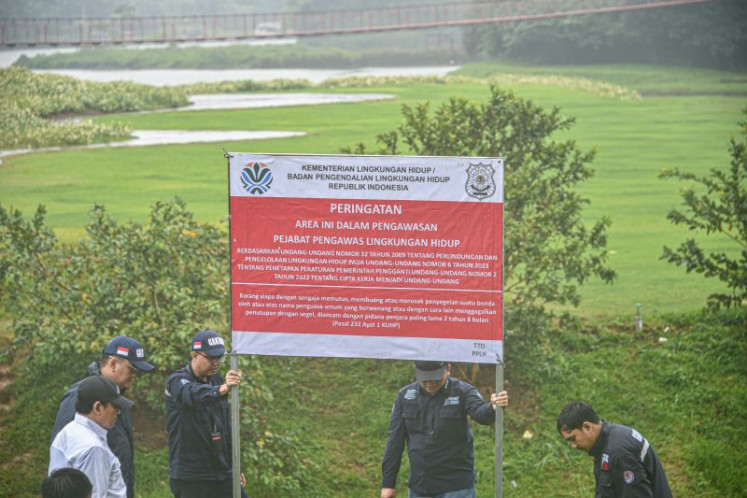 An environmental ministry officials seal the Lido Special Economic Area in Bogor, West Java, on Feb 6, 2025.