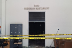 A police line is seen in front of the Public Relations Bureau of the Agrarian and Spatial Planning Ministry/National Land Agency (BPN) building in Jakarta on Feb. 9, 2025. Fire ravaged the bureau's office on the evening of Feb. 8, 2025.