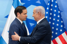 US Secretary of State Marco Rubio (left) and Israeli Prime Minister Benjamin Netanyahu greet each other during a joint press conference at the prime minister's office in Jerusalem on February 16, 2025. 