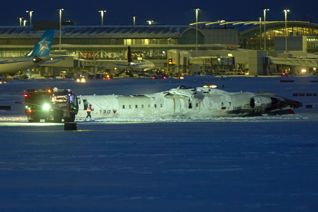 Delta Plane Overturns on Landing at Toronto Airport, 18 Injured