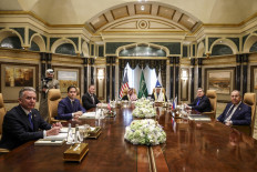 United States Middle East envoy Steve Witkoff, Secretary of State Marco Rubio, National Security Advisor Mike Waltz, Saudi Arabia's Foreign Minister Prince Faisal bin Farhan al-Saud, National Security Advisor Mosaad bin Mohammad al-Aiban, the Russian president's foreign policy advisor Yuri Ushakov, and Russia's Foreign Minister Sergei Lavrov (left to right) attend a meeting together at Riyadh's Diriyah Palace on February 18, 2025.