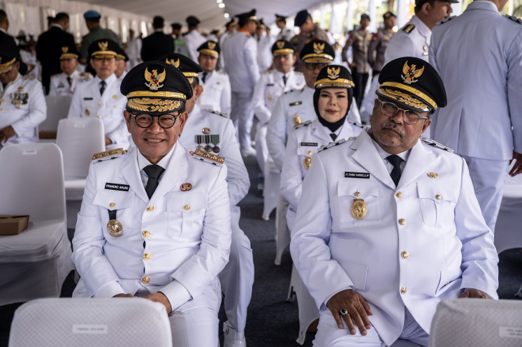 Jakarta Governor and Deputy Governor Pramono Anung (left) and Rano Karno (right) prepare to take part in the parade at the Monas Cross Square, Jakarta, on Thursday, February 20, 2025. President Prabowo Subianto will simultaneously inaugurate as many as 961 elected regional heads as a result of the 2024 Regional Elections, consisting of 33 governors and 33 deputy governors, 363 regents, 362 deputy regents, 85 mayors and 85 deputy mayors at the Presidential Palace. 
