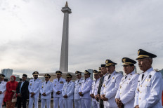 A number of elected regional heads from Aceh province gather at the National Monument (Monas) in Jakarta on February 20 shorty before their inauguration ceremony.