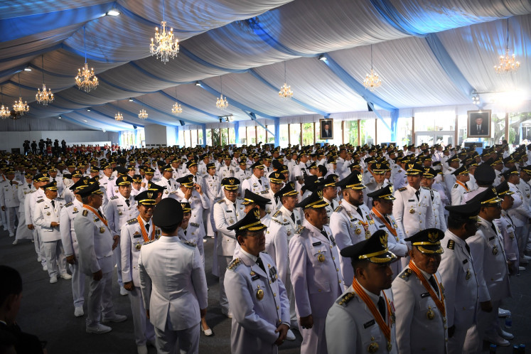 Regional heads and their deputies line up on Feb. 20 ahead of their inauguration ceremony at the Presidential Palace in Jakarta.