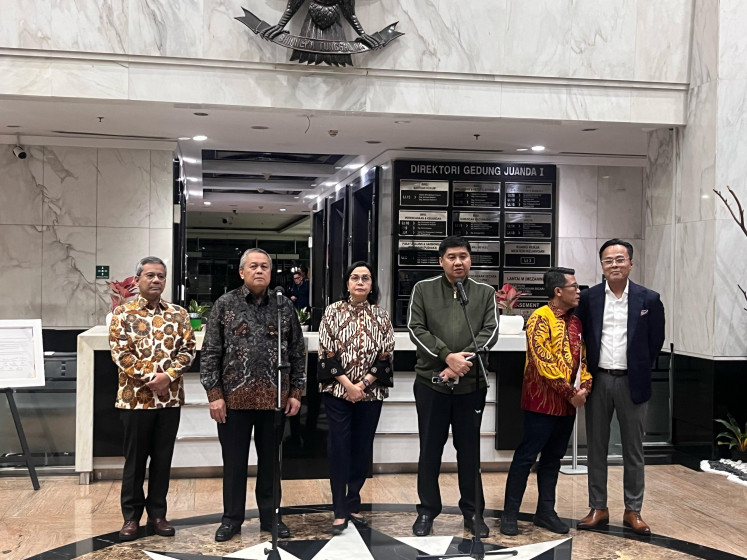 Housing and Settlements Minister Maruarar Sirait and Finance Minister Sri Mulyani Indrawati hold a join press conference with other key stakeholders including Bank Indonesia (BI) Governor Perry Warjiyo, chairman of House of Representatives Commission XI Mukhamad Misbakhun, Deputy State-Owned Enterprises (SOEs) Minister Dony Oskaria and Deputy Finance Minister Suahasil Nazara in Jakarta on Feb. 21, 2025.