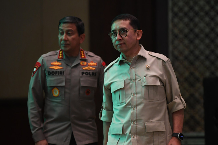 Freedom of speech?: Culture Minister Fadli Zon (right), who also serves as the chair of the Indonesian Farmers Association (HKTI), walks alongside National Police deputy chief Comr. Gen. Ahmad Dofiri on Feb. 21 at the opening ceremony of the second installment of the Young Farmers Academy in Jakarta.
