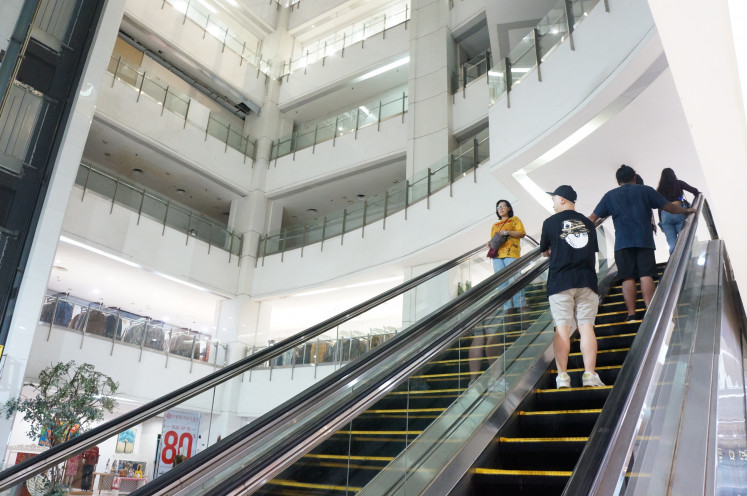 Fading glory: Only few visitors are seen at the aging Pasaraya Blok M mall in Jakarta on Feb. 1.