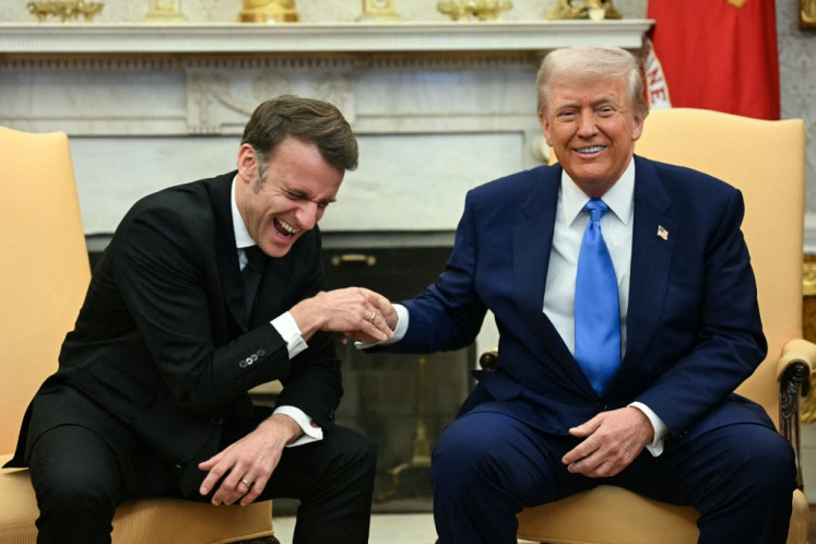 US President Donald Trump meets with French President Emmanuel Macron in the Oval Office of the White House in Washington, DC, on February 24, 2025. 
