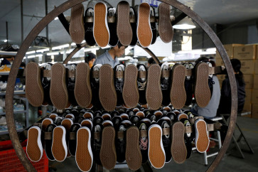 Shoes for export are seen at a factory on Dec. 29, 2020, in Hanoi.