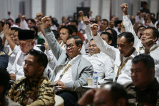 Jakarta's governor Pramono Anung (center) gestures on Tuesday beside other regional leaders during a week-long mountain retreat at a military academy in Magelang, Central Java. 