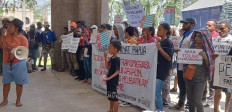 Resisting harmful displacement: A group of people rally against the government-sponsored transmigration program on Nov. 15, 2024, in Sorong, Southwest Papua.