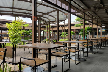 Empty chairs and tables stand at the Rans Nusantara Hebat food court in Tangerang regency, Banten, owned by celebrity and presidential envoy Raffi Ahmad and Kaesang Pangarep, younger son of former president Joko “Jokowi“ Widodo, in this undated photo.