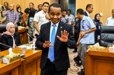 Energy and Mineral Resources Minister Bahlil Lahadalia gestures on Feb. 3, 2025, as he prepares to attend a work meeting with lawmakers from House of Representatives Commission XII overseeing energy and mineral resources at the House complex in Senayan, Central Jakarta.