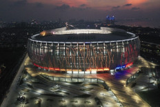 Illumined arena: The Jakarta International Stadium is seen from the air on April 17, 2022, in North Jakarta.