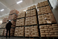 This photo taken on March 7, 2025 shows stockpiled rice in a government warehouse in Kanagawa prefecture. Japan's Ministry of Agriculture, Forestry and Fisheries announced that it will begin bidding on March 10 for the release of government stockpiled rice.
