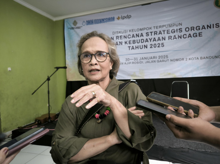 Rancagé Cultural Foundation chair Etty RS answers questions from the press after announcing the winners of the 2025 Rancagé Literary Award at the Ajip Rosidi Library in Bandung, West Java, on Jan. 31, 2025. The Rancagé Literary Awards have been honoring literary works in regional mother tongues published in book format since 1989.