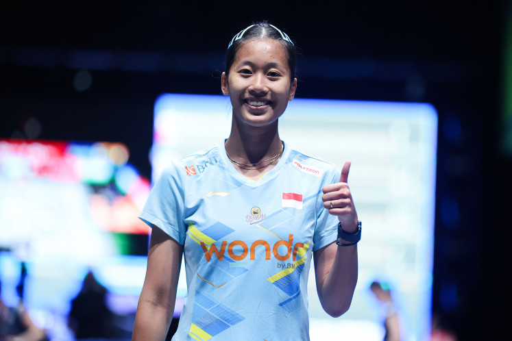 Indonesian shuttler Putri Kusuma Wardani poses as she participates in the opening round of the 2025 All England badminton championships in Birmingham, the United Kingdom, on March 11, 2025.