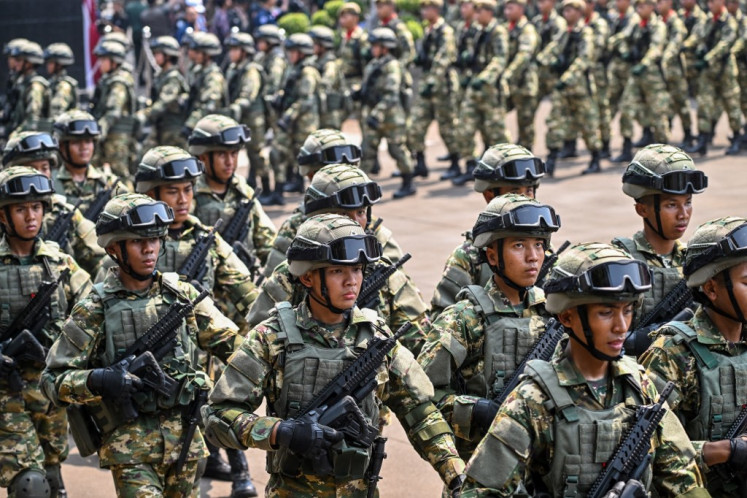 Troops attend a defense minister handover ceremony from Prabowo Subianto to his successor Sjafrie Sjamsoeddin on Oct. 22, 2024, at the Defense Ministry office in Jakarta.