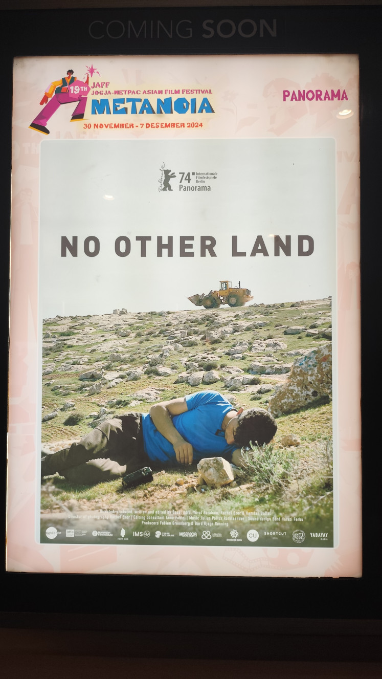 Best Documentary winner: A poster for the film No Other Land is seen on Nov. 30, 2024, during the Jogja-NETPAC Asian Film Festival (JAFF) at XXI Theater in Yogyakarta.
