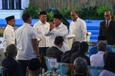 President Prabowo Subianto (center), accompanied by several cabinet ministers and officials, greets rectors and other leaders of higher education institutions on Thursday during a gathering at the State Palace in Jakarta. During the gathering attended by 184 rectors from universities across the country, the President expressed his ideas regarding higher education in Indonesia on March 13, 2025.