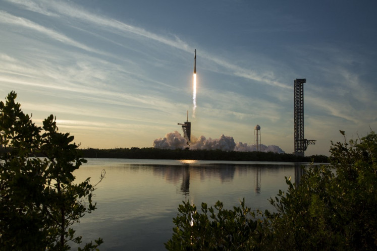 In this NASA handout, a SpaceX Falcon 9 rocket carrying the company's Dragon spacecraft for the Crew-10 mission to the International Space Station (ISS) takes off at NASA's Kennedy Space Center on March 14, 2025 in Cape Canaveral, Florida, the United States. NASA's SpaceX Crew-10 mission is the tenth crew rotation mission of the SpaceX Crew Dragon spacecraft and Falcon 9 rocket to the ISS as part of the agency's Commercial Crew Program.