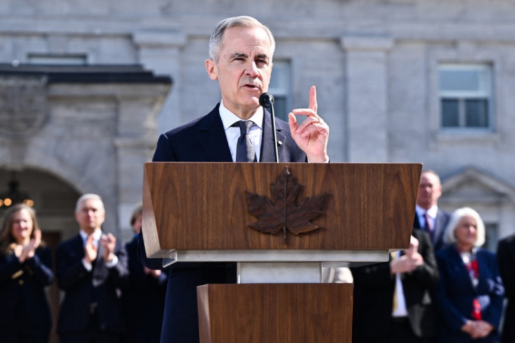 New Canadian Prime Minister Mark Carney addresses the media after being sworn in at Rideau Hall on March 14, 2025 in Ottawa, Ontario, Canada. Carney, a former central banker, replaces Justin Trudeau as Prime Minister and Liberal Party leader as the country faces a trade war with the United States. 