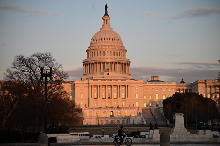 The sun shines onto the US Capitol building in Washington, DC, on March 4, 2025.