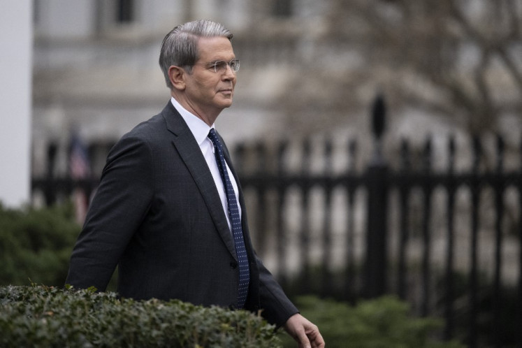 Treasury Secretary Scott Bessent walks out of the West Wing to do a television interview on the North Lawn of the White House on March 14, 2025 in Washington, DC. 