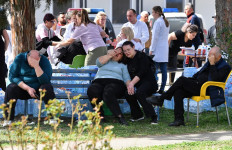 Relatives of the victims of an overnight fire in a crowded nightclub in North Macedonia, wait for news of their loved ones at the Kocani General Hospital in Kocani, on March 16, 2025. A fire tore through an overcrowded nightclub packed with mostly young people in North Macedonia overnight, killing 59 people, apparently after on-stage fireworks at a hip-hop concert set the venue ablaze, authorities said. Some 155 people who were injured in the inferno had been taken to hospitals across the country, 22 of them in critical condition, officials said. 
