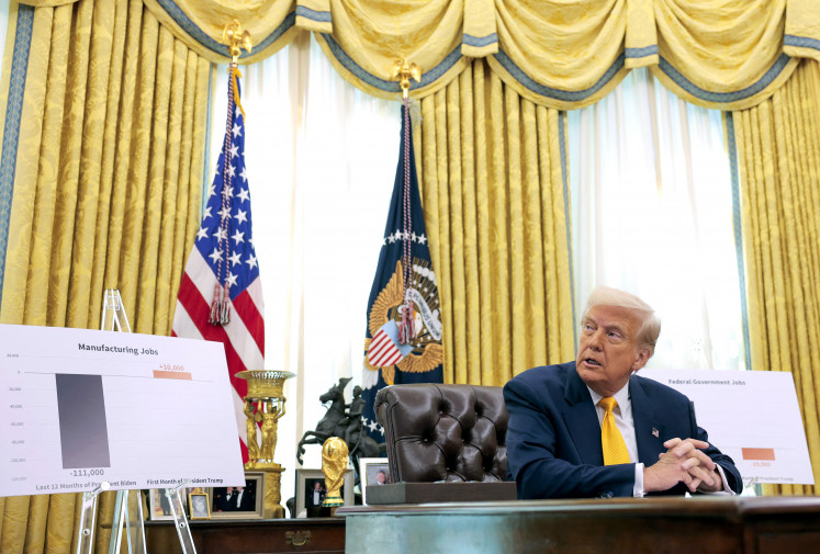 Dim outlook: United States President Donald Trump delivers remarks on the jobs report on March 7 from the Oval Office at the White House in Washington, DC.