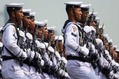 Indonesian Navy personnel march during an event in celebration of the 79th anniversary of the Indonesian Military (TNI) at the National Monument (Monas) complex in Jakarta on Oct. 5, 2024.