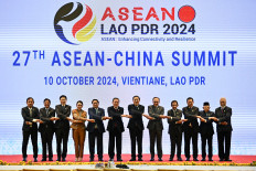 ASEAN and China should join hands in facing trade storms 