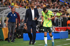 Indonesia's head coach Patrick Kluivert gives instructions on the touchline during the World Cup 2026 Asian qualifier football match between Australia and Indonesia at Allianz Stadium in Sydney on March 20, 2025. (
