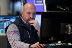 A trader works on the floor at the New York Stock Exchange (NYSE) in New York City, US, on March 21, 2025.