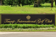 This photo taken on March 13, 2025 shows a general view of the logo of the Trump International Golf Club, Lido, an 18-hole golf course spread across a 700-meter-high plateau, designed by renowned South African professional golfer and course architect Ernie Els, at the club's entrance in Bogor, West Java.