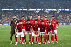 Indonesian national soccer team players pose for a group photo ahead of their 2026 World Cup Asian qualifier match between Australia and Indonesia in Sydney on March 20, 2025.
