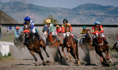 Jockeys compete in a horse race hosted by Sarga in this undated photo file. (Courtesy of Sarga)