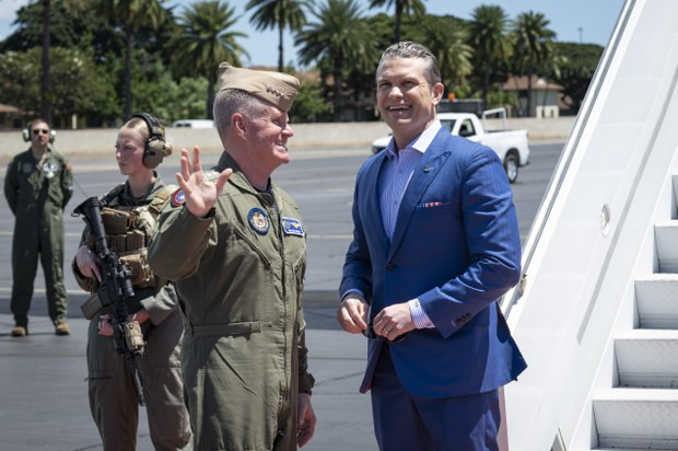 United States Defense Secretary Pete Hegseth is greeted by Adm. Samuel Paparo, the head of the US Indo-Pacific Command, upon his arrival at Joint Base Pearl Harbor-Hickam in Honolulu, US, March 24, 2025.