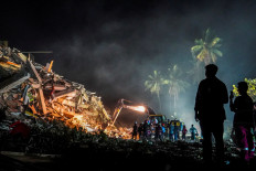 Woman pulled alive from Myanmar earthquake rubble, race to find more survivors