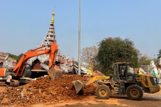A person operates machinery following a strong earthquake, in Mandalay, Myanmar, March 31, 2025. 