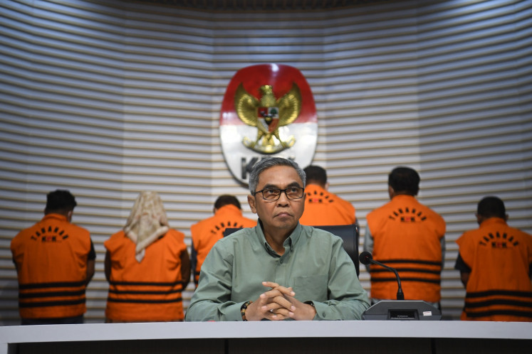 Setyo Budiyanto, chairperson of the Corruption Eradication Commission (KPK), prepares to address a press conference on March 16, 2025, at KPK headquarters in Kuningan, South Jakarta, where the agency presented six suspects in a graft case involving the Ogan Komering Ulu Public Works And Housing Agency of South Sumatra.