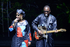 Malian musicians Amadou Bagayoko and Mariam Doumbia from the Amadou et Mariam band, perform during the Equator Prize 2015 award ceremony, as part of various events held during the COP21 United Nations Climate Change Conference, at the Mogador theatre in Paris on December 7, 2015. 