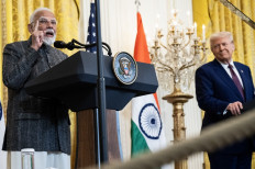 United States President Donald Trump (right) and Indian Prime Minister Narendra Modi hold a joint press conference in the East Room of the White House in Washington, DC, on Feb. 13, 2025.