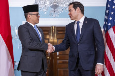 Foreign Minister Sugiono (left) shakes hands with United States Secretary of State Marco Rubio (right) as they meet at the State Department in Washington, DC on April 16, 2025.