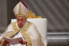 Pope Francis leads a mass during the first Vespers and the Te Deum prayer as part of the New Year's celebrations in Saint Peter's Basilica, at the Vatican, on December 31, 2024.
