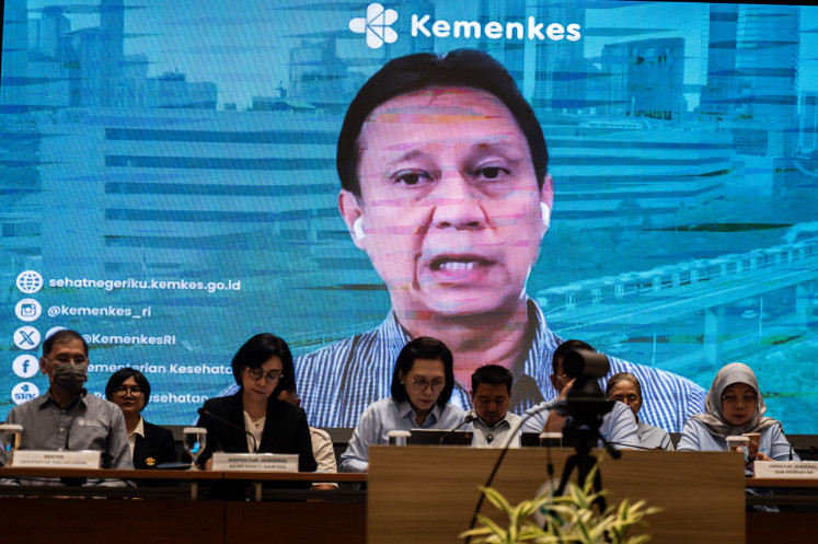 Health Minister Budi Gunadi Sadikin answers journalists' questions via live video call during the ministry's press conference in Jakarta on April 21.