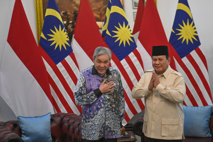 President Prabowo Subianto (right) receives Malaysian Deputy Prime Minister Ahmad Zahid Hamidi ahead of a bilateral meeting at the State Palace in Jakarta on April 22, 2025.