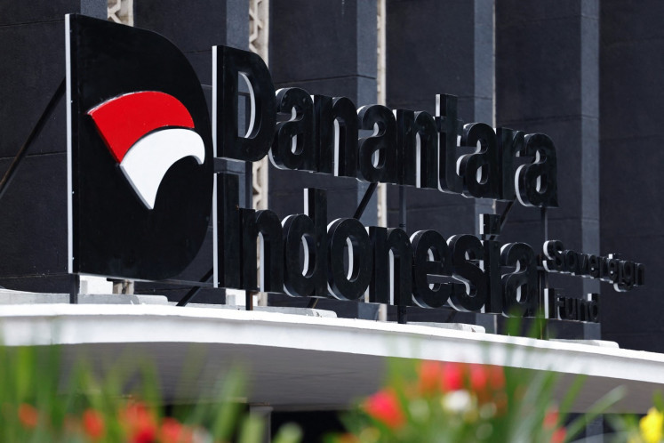 A sign for sovereign wealth fund Danantara Indonesia is seen in front of its headquarters in Jakarta on Feb. 28, 2025.