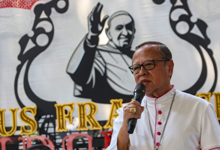 Jakarta Archbishop Ignatius Suharyo speaks during the launching ceremony of a new series of stamps ahead of a visit to Jakarta by Pope Francis at the Jakarta Cathedral in Jakarta on Sept. 2, 2024.